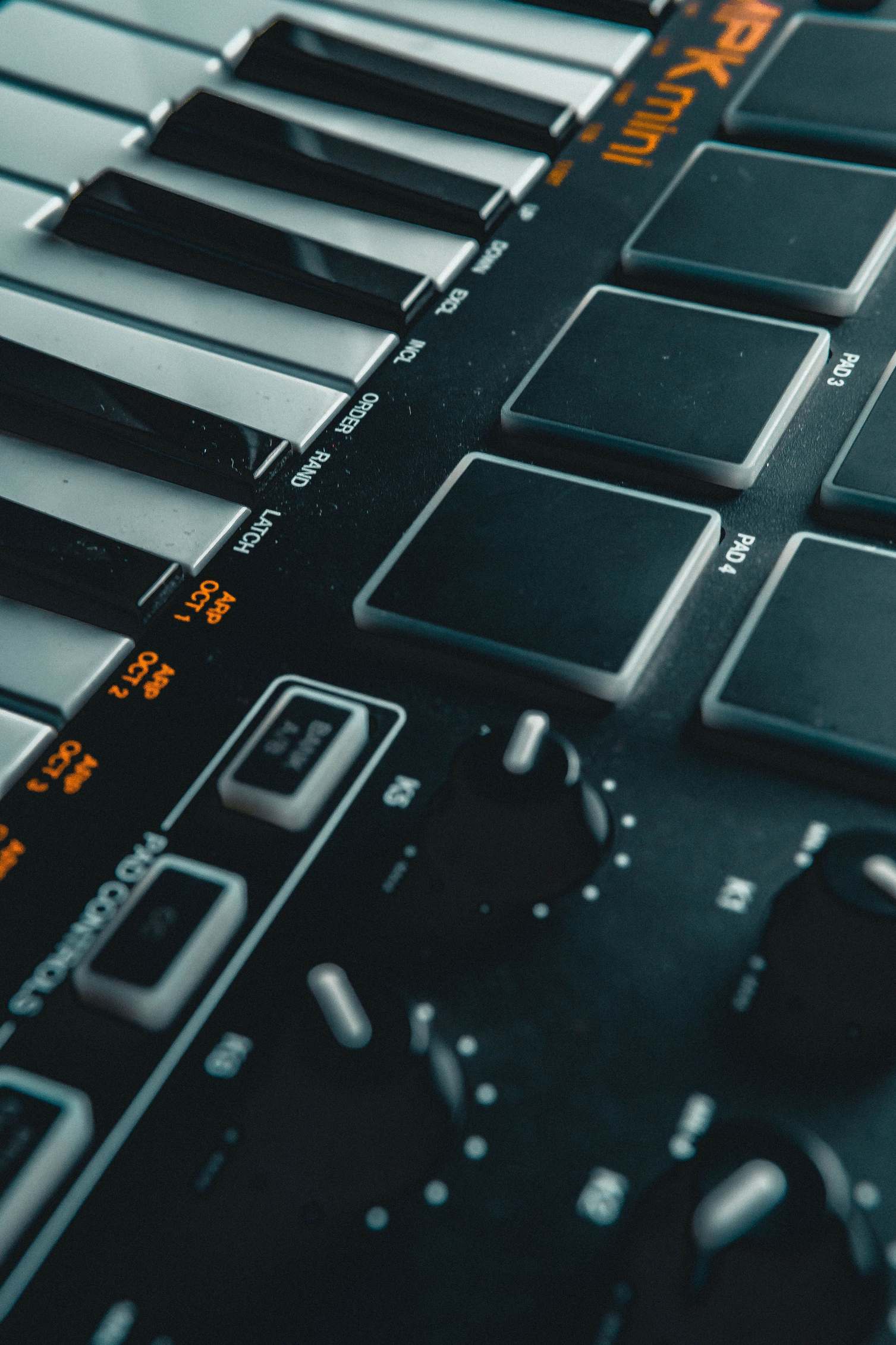 Close view of keyboard and cabling at a technical workstation with electronic keyboard keys
